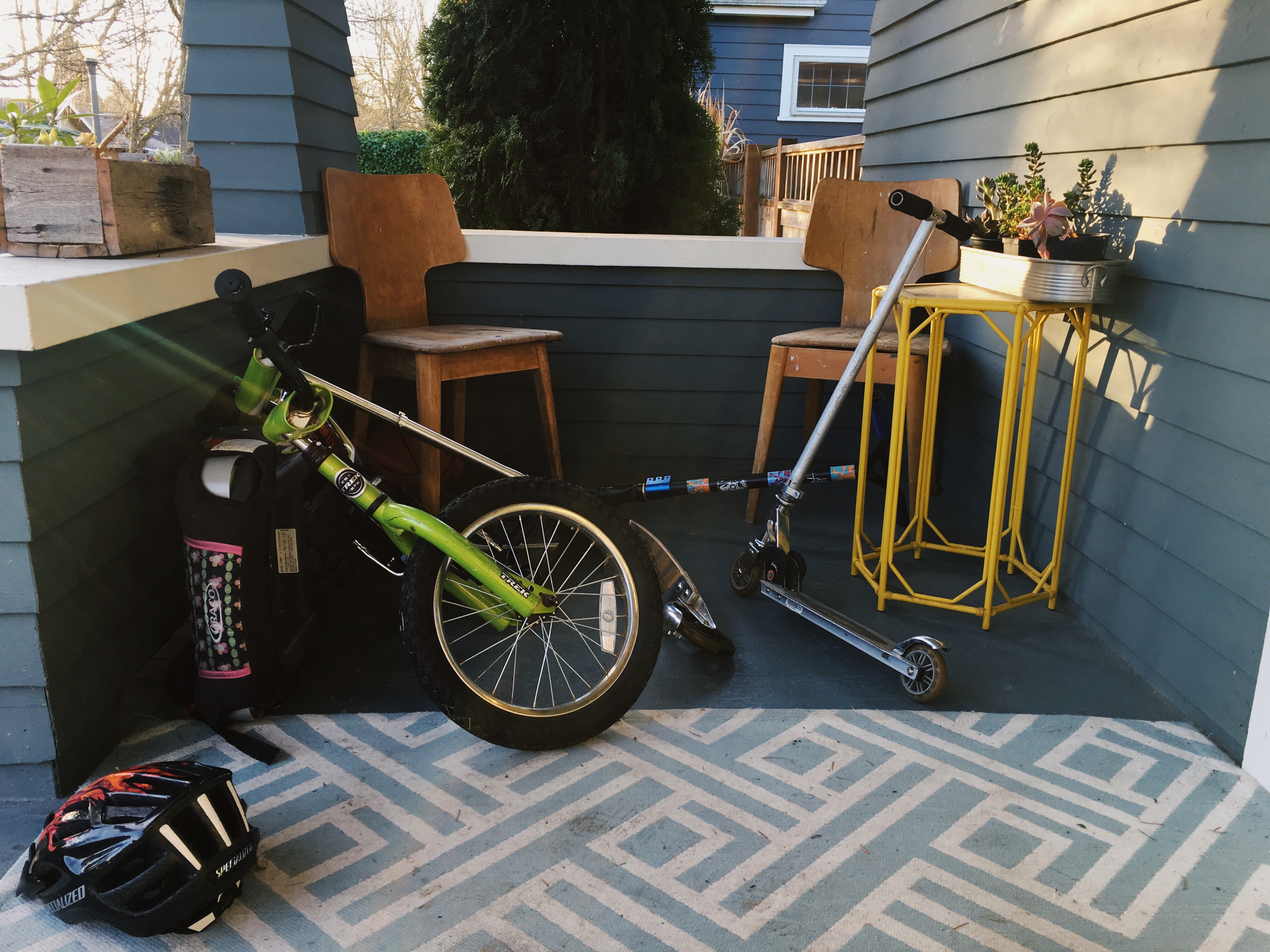 bike and scooter on porch - Documentary Family Photography