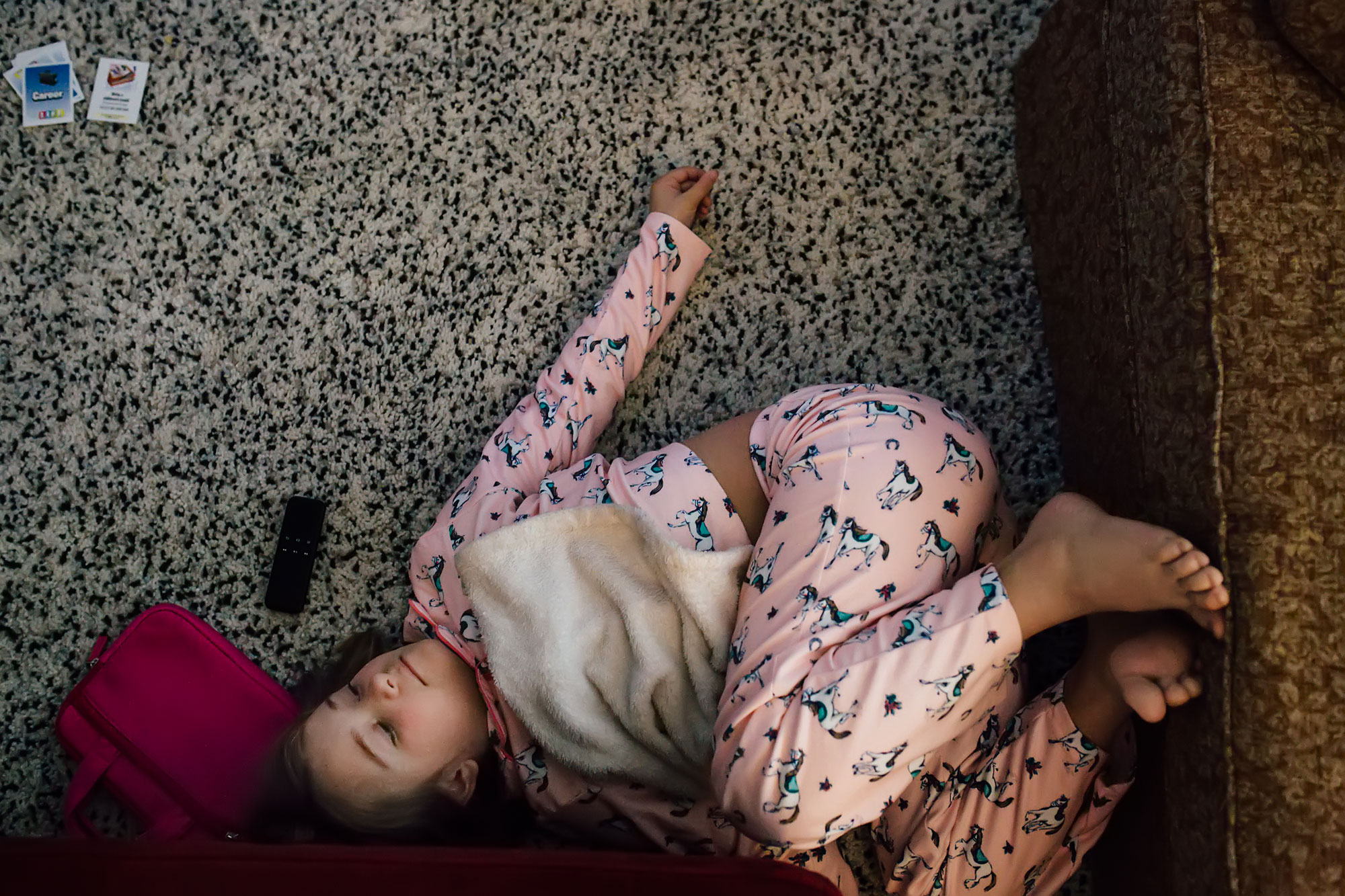 girl lying on floor -Documentary Family Photography