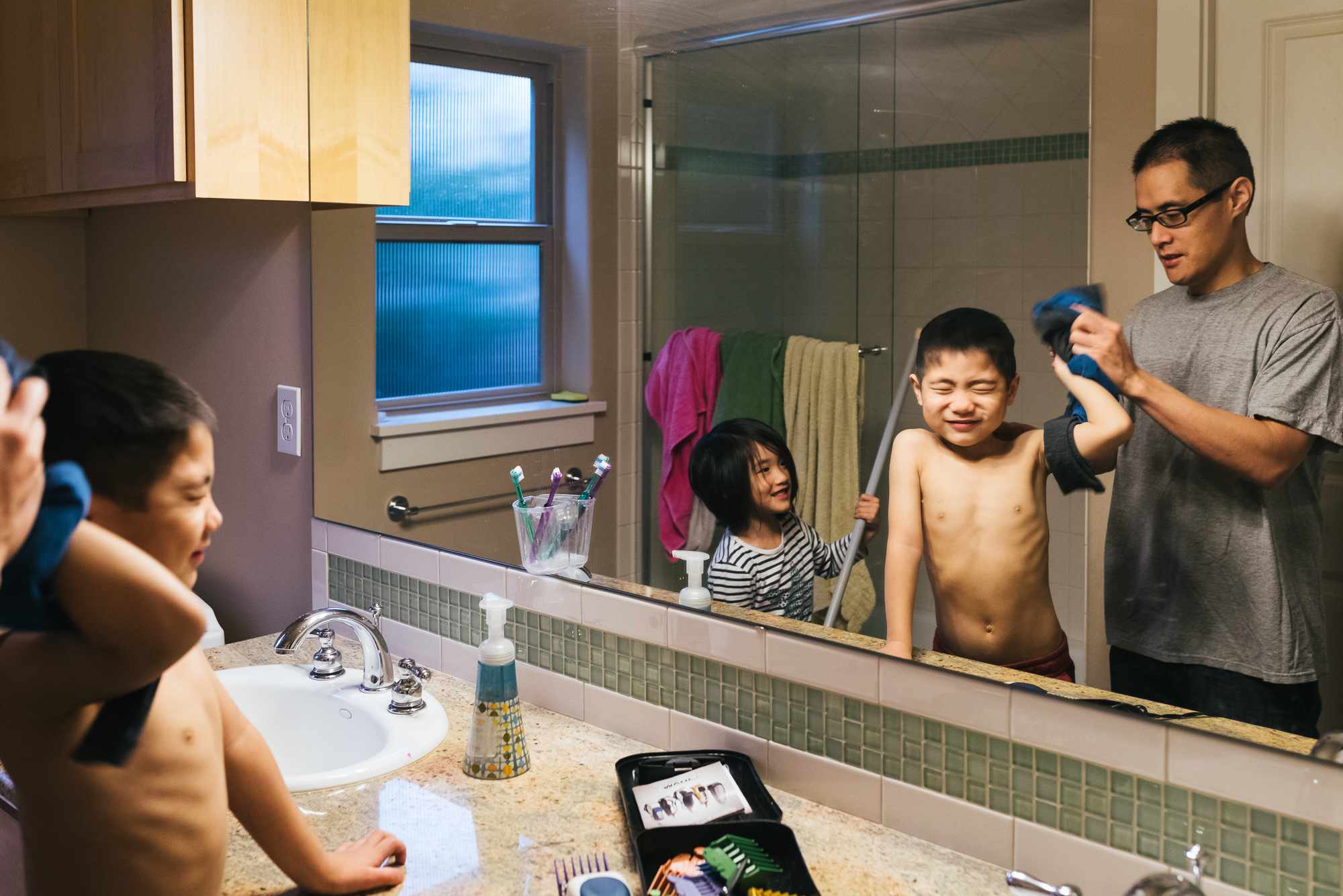 kinds in bathroom mirror - Documentary Family Photography